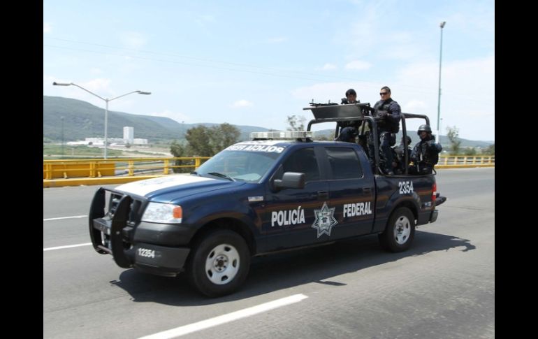 La Policía Federal encuentra un cuerno de chivo, un cargador con 15 cartuchos y una granada calibre 40. EL INFORMADOR  ARCHIVO  /