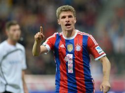 Thomas Müeller, festeja uno de los goles de su equipo, el Bayern Múnich AFP / C. Stache