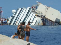 El naufragio del Costa Concordia fue ocasionado porque la nave chocó contra los escollos de la isla del Giglio. AFP / ARCHIVO.