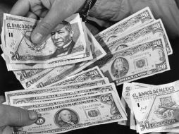 La ganancia de la moneda norteamericana fue de cuatro centavos respecto al cierre previo. EL INFORMADOR / ARCHIVO