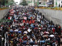 Durante la marcha, recuerdan al recién fallecido Raúl Álvarez Garín. SUN / A. Ojeda