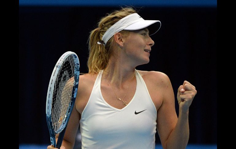 Sharapova es la actual cuatro del planeta; se instala en la final del certamen al derrotar a la serbia Ana Ivanovic. AFP / G. Chai Hin