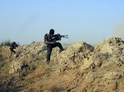 Fuerzas de seguridad iraquí vigilan las zonas después de enfrentamientos con militantes del Estado Islámico. AP / STR