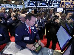 El Standard & Poor's 500 reporta una leve alza y se coloca en mil 935.76 unidades. AP / ARCHIVO