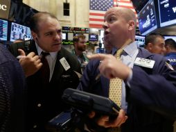 El Dow Jones gana 274.76 puntos, el selectivo S&P junto con el Nasdaq también se mostraron en aumento. AP / ARCHIVO.