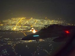 Imagen de la aeronave FA 18f sobre una ciudad en Iraq. AFP / H. Paterson
