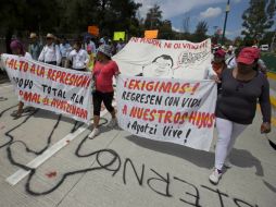 Normalistas y defensores de DH calificaron el asesinato y desaparición de estudiantes en Iguala, Guerrero, como un crimen de estado. AP / E. Verdugo.