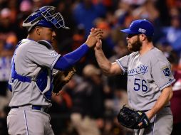 El pitcher Greg Holland apunta que los Reales han aprendido a ganar los partidos apretados en los últimos innings. AFP / P. Smith