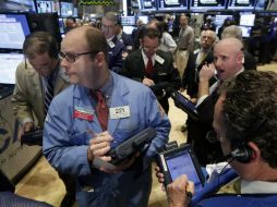 Las ganancias son moderadas ante el nerviosismo sobre el brote de ébola y los conflictos geopolíticos. AP / R. Drew