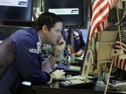 Aunque el principal indicador registra pérdidas, el S&P 500 y el Nasdaq terminan en positivo. AP / ARCHIVO
