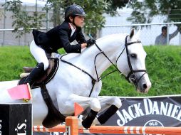 A lomos de 'Puertas Blue Dream', Gaspar se consagró como triunfador del Campeonato Mundial Infantil 2013, efectuado en Avándaro. EL INFORMADOR / ARCHIVO