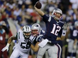 Tom Brady lanzó para 261 yardas y tres pases de anotación. AP / C. Krupa