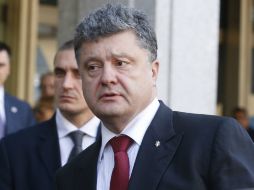 Poroshenko y Putin sostuvieron un encuentro en Milán. AP / L. Bruno.