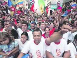 Descontento. Caraqueños demandan poner fin a las violaciones a los derechos humanos, la escasez alimentaria y la crisis de salud. AP /