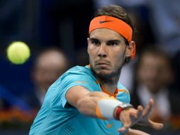 Nadal se llevó el partido en 56 minutos donde consiguió tres 'breaks' consecutivos. EFE / F. Coffrini