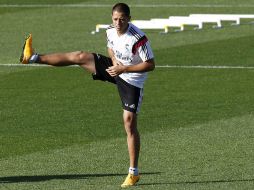 La práctica de hoy consistió en ejercicios de calentamiento, potenciación muscular, rondos y toques al balón. EFE / J. Guillén