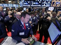 El mercado accionario estadounidense avanza pese al reporte de una tendencia a la baja de hoy. AP / ARCHIVO