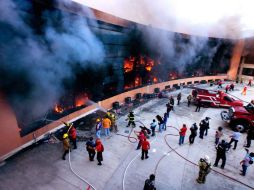 Agentes del Ministerio Público y especialistas en criminalística participan en la determinación de la gravedad de los daños. SUN / ARCHIVO