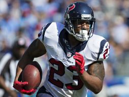 Arian Foster corrió para 151 yardas y anotó en tres ocasiones. AFP / W. Hitt