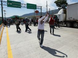 La manifestación es parte de la lucha para exigir la localización y presentación con vida de sus compañeros. EFE / J. Méndez