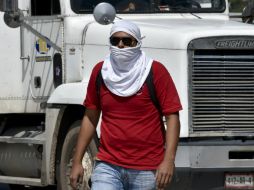 Exigen la investigación a Ángel Aguirre por su responsabilidad en la desaparición de 43 estudiantes. AFP / Y. Cortez