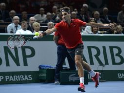 Federer tiene al alcance el número uno del mundo, del que le separan 490 puntos. AFP / M. Medina