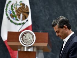 ''Comparto una absoluta indignación por lo sucedido'', dice Peña, en relación a los jóvenes normalistas desaparecidos. AFP / Y. Cortez