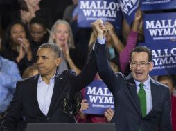 El presidente acompaña al gobernador demócrata Dannell Malloy a dos días de los comicios en Connecticut. AP / J. Minchillo