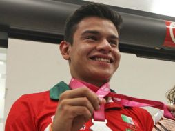 El saltarín conquista dos medallas en Nanjing 2014 y dos en el Mundial Juvenir en Rusia. SUN / RCC