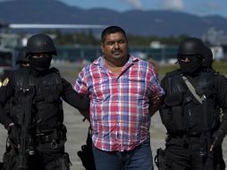 ''El Negro Sosa'' es trasladado vía aérea a la Ciudad de Guatemala, donde fue puesto a disposición de un juez competente. EFE / S. Martínez