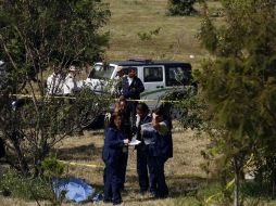Médicos forenses realizan indagatorias para establecer las causas del deceso. EFE / ARCHIVO
