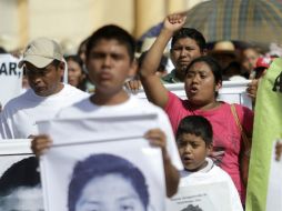 La protesta no deja de ser una exigencia a la localización con vida de los 43 normalistas y el castigo a los culpables de todo tipo. AFP / P. Pardo