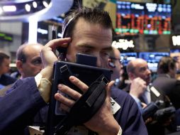 El tecnológico Nasdaq alcanza hoy las 4 mil 688.54 unidades. AP / ARCHIVO