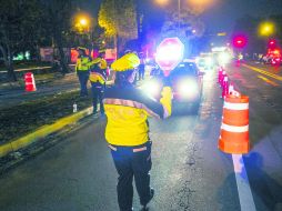Operativo. Una centena de mujeres de la Policía Vial participa en los operativos de alcoholimetría. EL INFORMADOR /