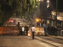 Aspectos de los actos violentos en CU, en los que dos estudiantes fueron heridos por un agente de la PGJDF. SUN / C. Blanquet