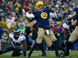 Aaron Rodgers rompe el récord de Tom Brady de más pases seguidos como local sin una sola intercepción. AFP / R. Martínez