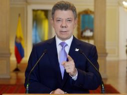 Juan Manuel Santos menciona que no reanudarán el proceso de paz hasta que se liberen a los secuestrados. EFE / J. Casella