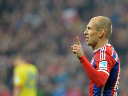 El centrocampista holandés, Arjen Robben, festeja su anotación durante el partido ante el Hoffenheim. AP / K. Joensson