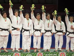 El quipo mexicano femenil de judo sube a recibir sus preseas y se despide de los JCC 2014 con amplias sonrisas. MEXSPORT / O. Martínez