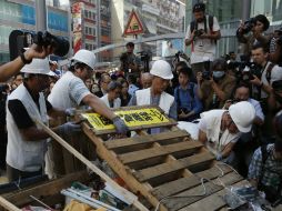 Los manifestantes tienen más de un mes ocupando las calles más importantes de Hong Kong. AP / K. Cheung
