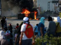 No comparten la violencia que se ha generado en las protestas en demanda de la presentación con vida de los 43 normalistas. AP / ARCHIVO