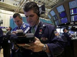 El viernes se abrirán los mercados para reestablecer una breve sesión. AP / ARCHIVO