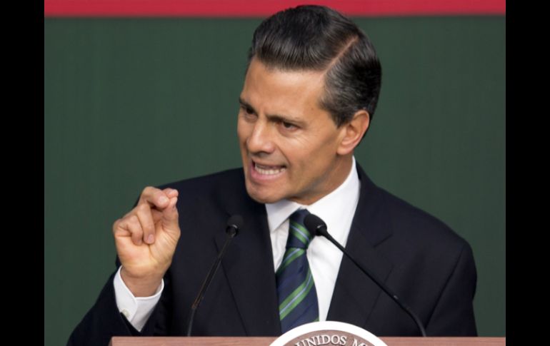 Enrique Peña Nieto advierte que en el país prácticamente se viven dos realidades. AP / E. Verdugo
