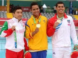 Julián Sánchez (i) se adjudicó la mañana de este viernes, la medalla de plata del trampolín tres metros individual. EFE / U. Ruiz