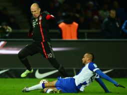 El tanto del holandés Arjen Robben es el único festejo del juego con el que Bayern gana al Hertha Berlín. AFP / J. Macdougall