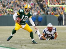 Aaron Rodgers lanzó dos pases de anotación para Green Bay. AFP / C. Petersen