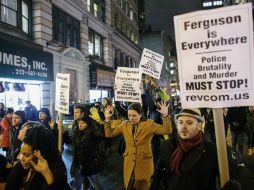 Cientos de manifestantes se dieron cita en el barrio Rockefeller Center en Manhattan. AFP / K. Betancur