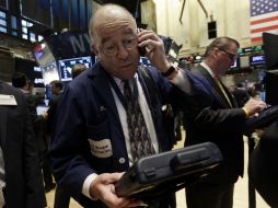 El Standard & Poor's 500 desciende 4.40 puntos (-0.21 por ciento). AP / R. Drew