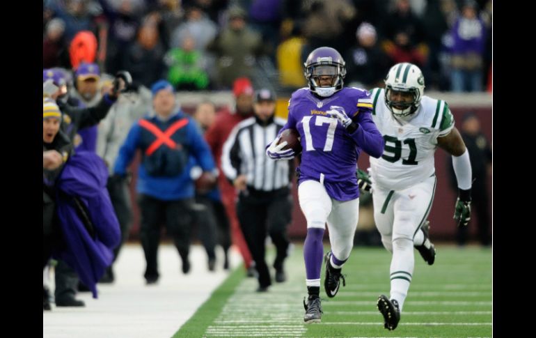 Jarius Wright logra una recepción para touchdown de 87 yardas. AFP / H. Folsien