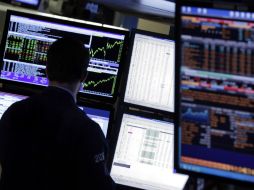 Salvo el Nasdaq, los demás índices de Wall Street abren la semana con leves bajas. AP / ARCHIVO